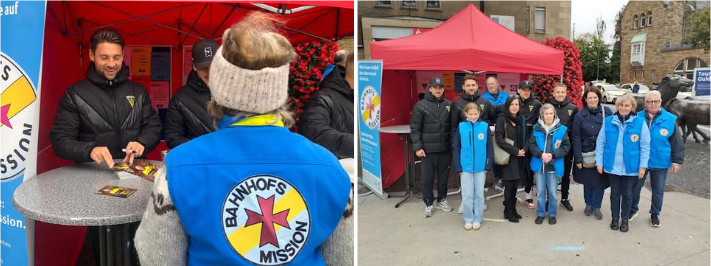 Alemania Spieler gibt Autogramm MitarbeiterInnen der Bahnhofsmission und Spieler von Alemania Aache
